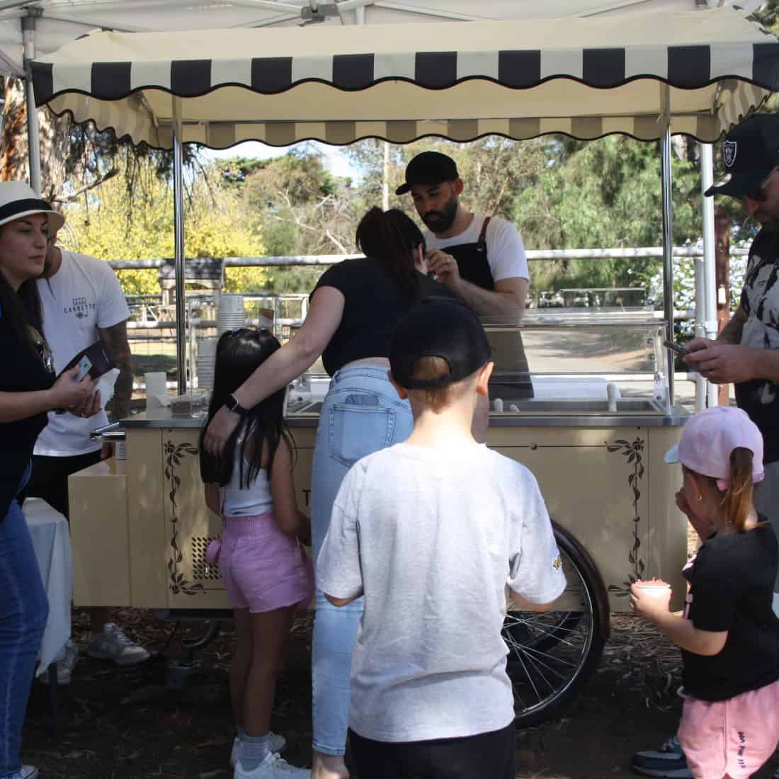 Queue of customer eager to try Carretto Gelato at Arundel family day in Keilor